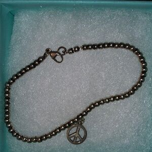 Tiffany & Co. peace sign bracelet